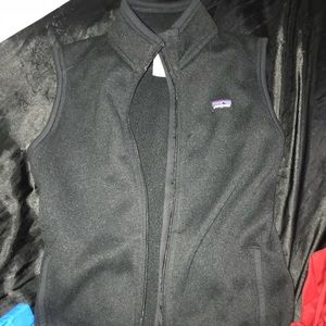 Black woman’s Patagonia “better sweater vest”